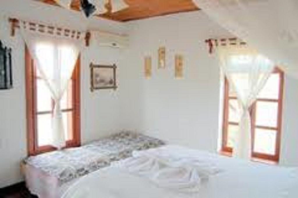 Salkim Konak Ve Agac Evler Guest House Селчук Стая снимка
